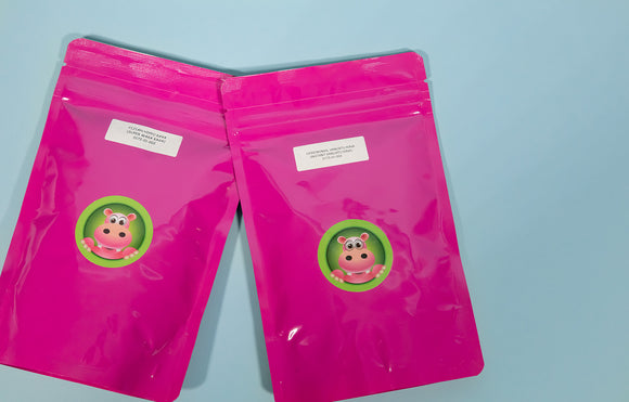 Featured image depicting two packages of Happy Hippo brand Kava Root powder against a blue background - One package contains Instant Ceremonial Vanuatu Kava Root, while the other contains Fijian Super Waka Kava Root.